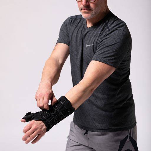 A man using Sprained Wrist Wrap