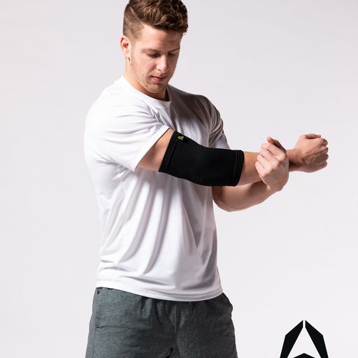 A man wearing Elbow Compression Sleeve